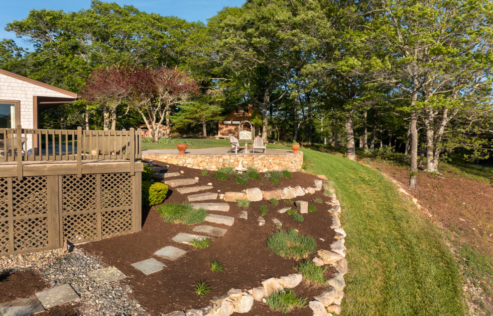 This is an example of a beach style garden in Providence.
