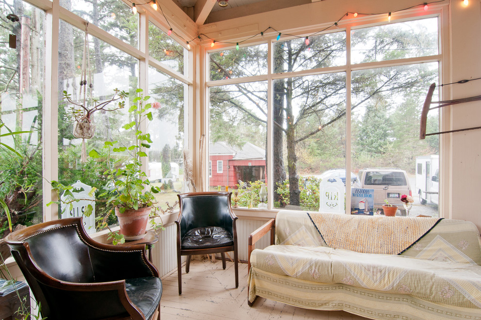 This is an example of a country sunroom in Other.