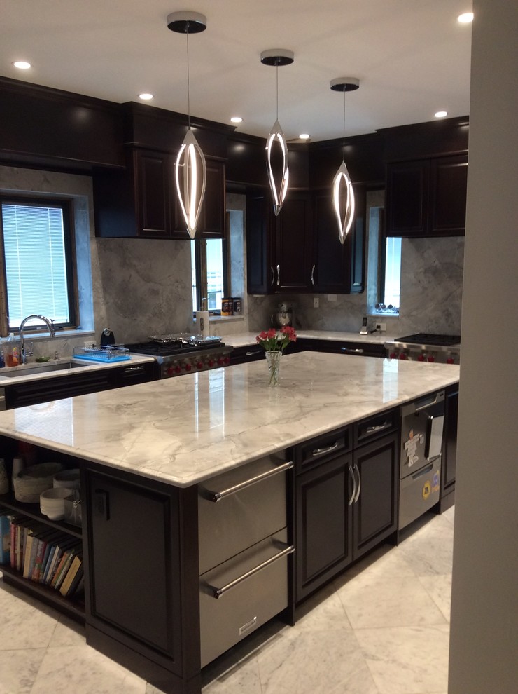 Mid-sized transitional u-shaped separate kitchen in New York with an undermount sink, recessed-panel cabinets, dark wood cabinets, marble benchtops, multi-coloured splashback, stone slab splashback, stainless steel appliances, marble floors, with island and white floor.
