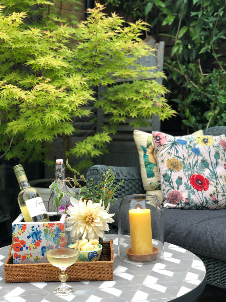 Patio - eclectic backyard patio idea in London