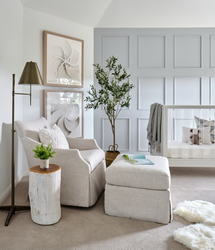 Belterra Project- Furnishings, Light Fixtures & Interior Design - In this the sweet nursery, the designer specified a blue gray paneled wall as the focal point behind the white and acrylic crib.  A comfortable cotton and linen glider and ottoman provide the perfect spot to rock baby to sleep.  A dresser with a changing table topper provides additional function, while adorable car artwork, a woven mirror, and a sheepskin rug add finishing touches and additional texture.