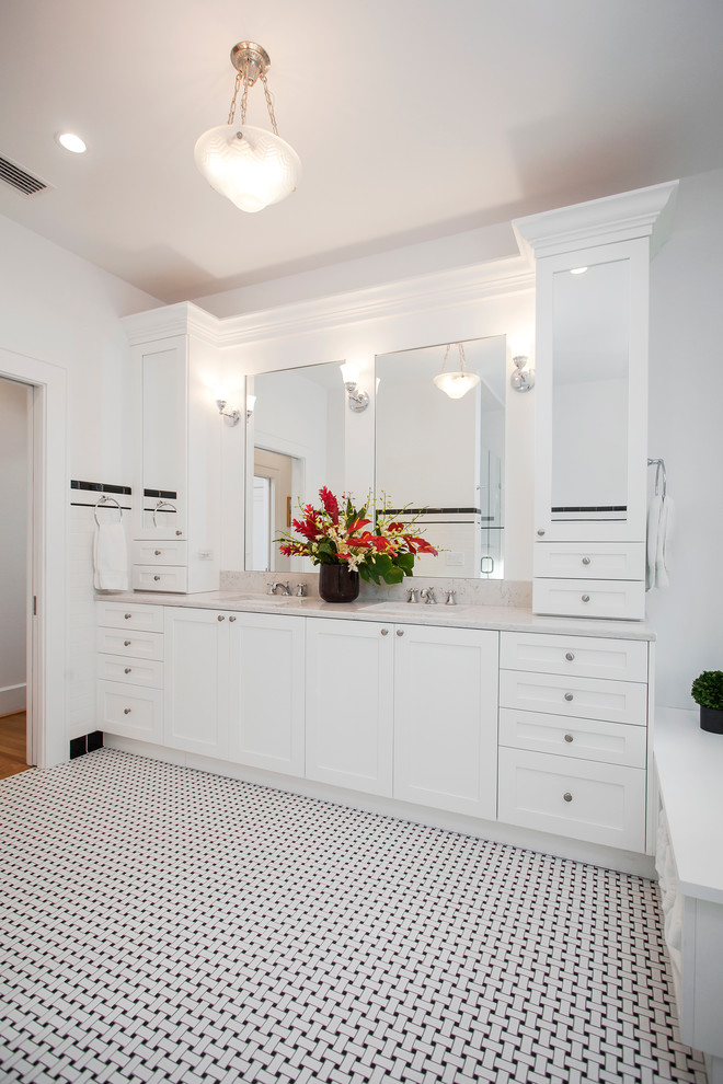 Inspiration for a large contemporary master bathroom in Tampa with shaker cabinets, white cabinets, an alcove shower, a two-piece toilet, white tile, subway tile, white walls, mosaic tile floors, an undermount sink and marble benchtops.