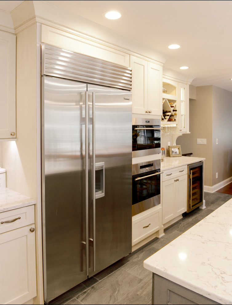 Example of a transitional kitchen design in New York
