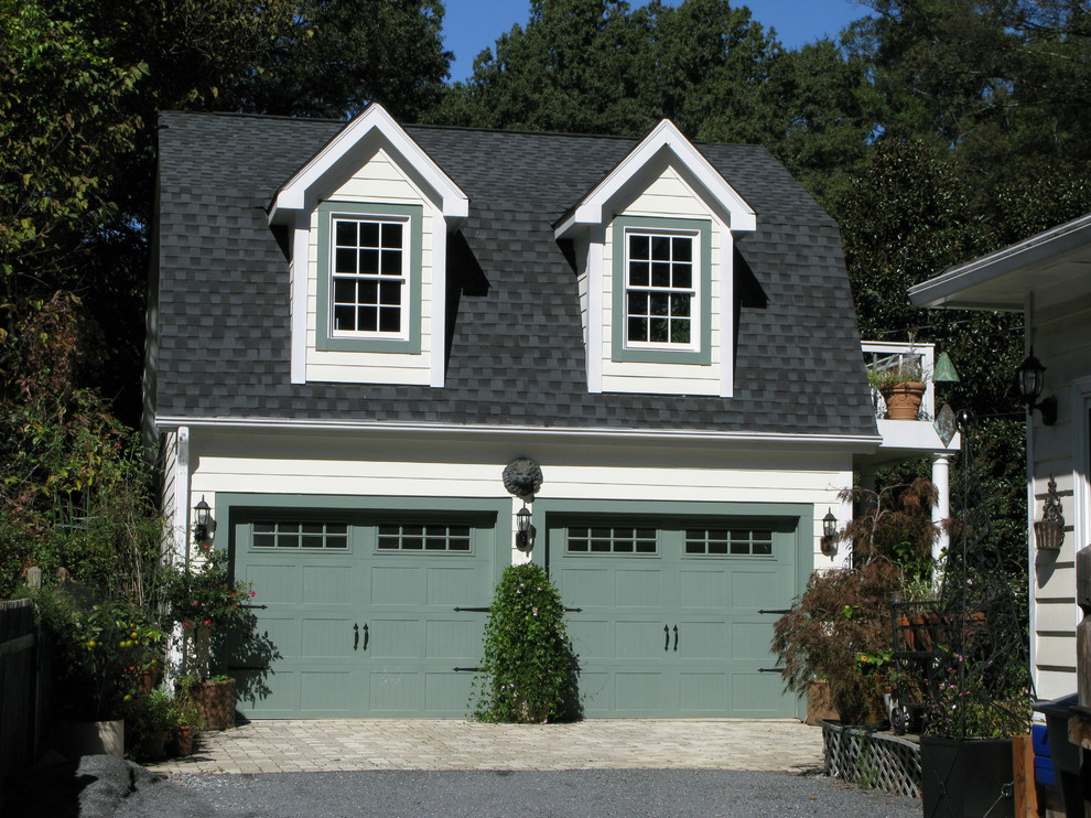 Inspiration for a traditional detached two-car garage in Charlotte.