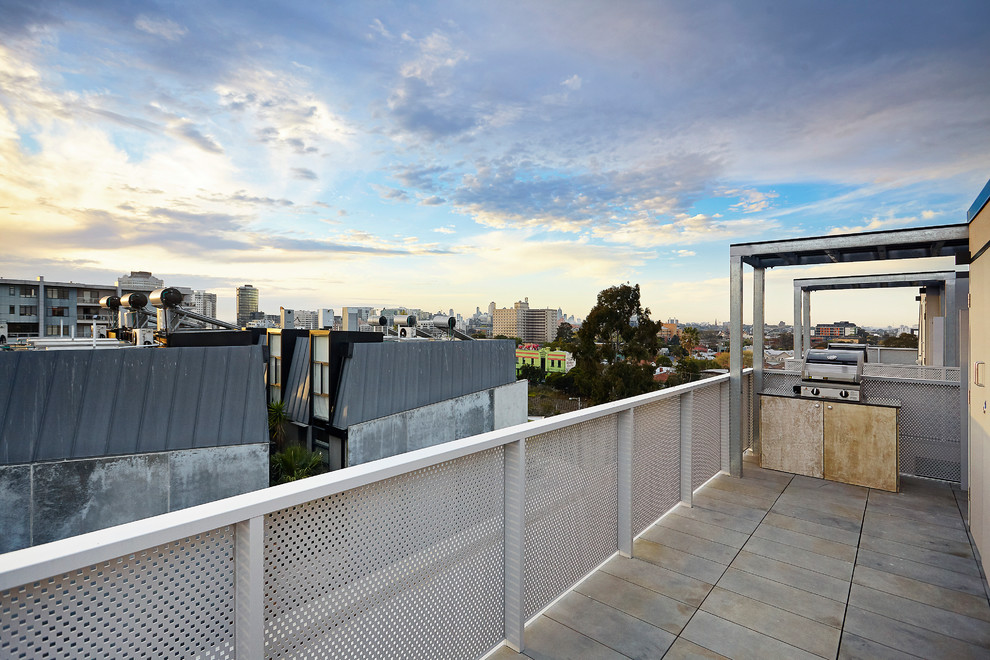 This is an example of a small industrial rooftop deck in Other.