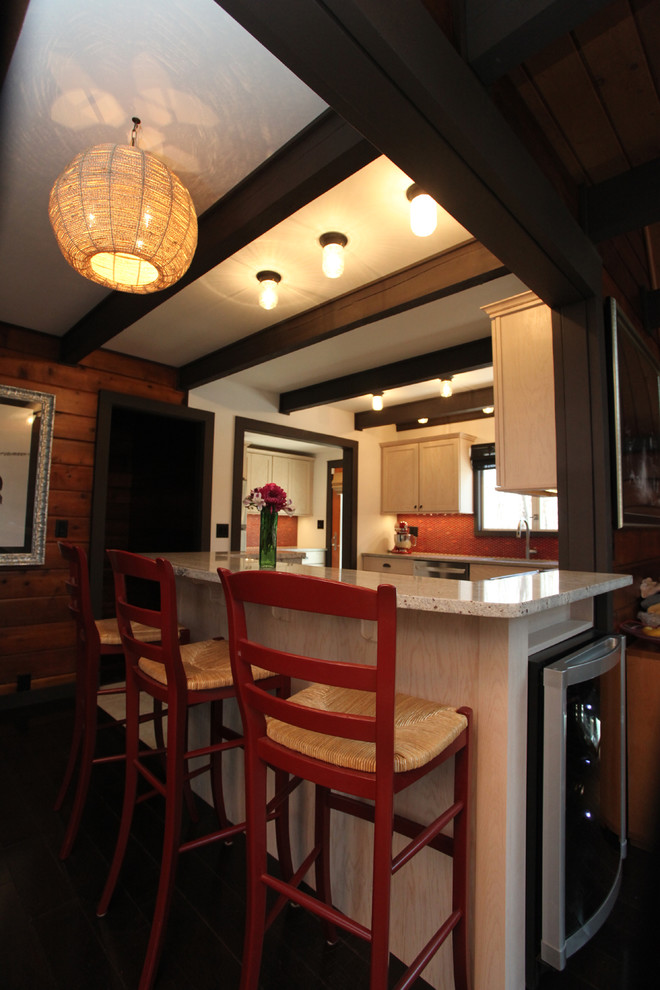 Example of a transitional ceramic tile kitchen design in New York with an undermount sink, shaker cabinets, light wood cabinets, granite countertops, red backsplash, ceramic backsplash and stainless steel appliances