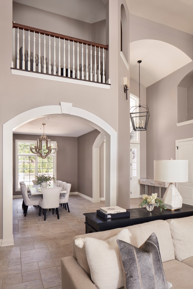 Inspiration for a mid-sized transitional open plan dining in Milwaukee with purple walls, carpet, a standard fireplace, a stone fireplace surround, beige floor and recessed.