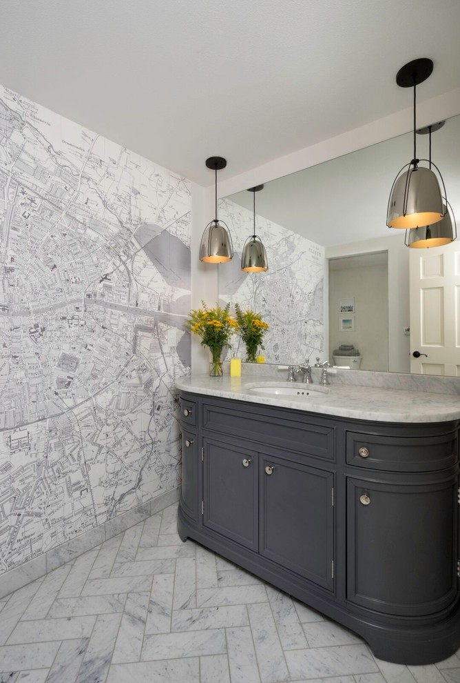 This is an example of a mid-sized transitional master bathroom in Portland with beaded inset cabinets, grey cabinets, marble floors, an undermount sink, white walls and marble benchtops.