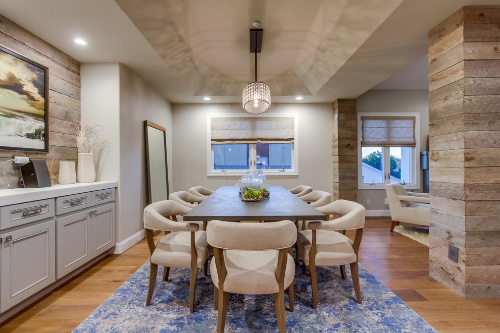 Mid-sized contemporary open plan dining in San Diego with grey walls, medium hardwood floors and no fireplace.