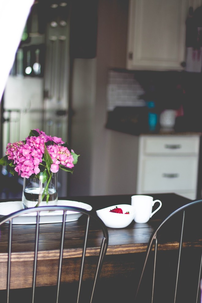 Inspiration for a rustic dining room remodel in St Louis