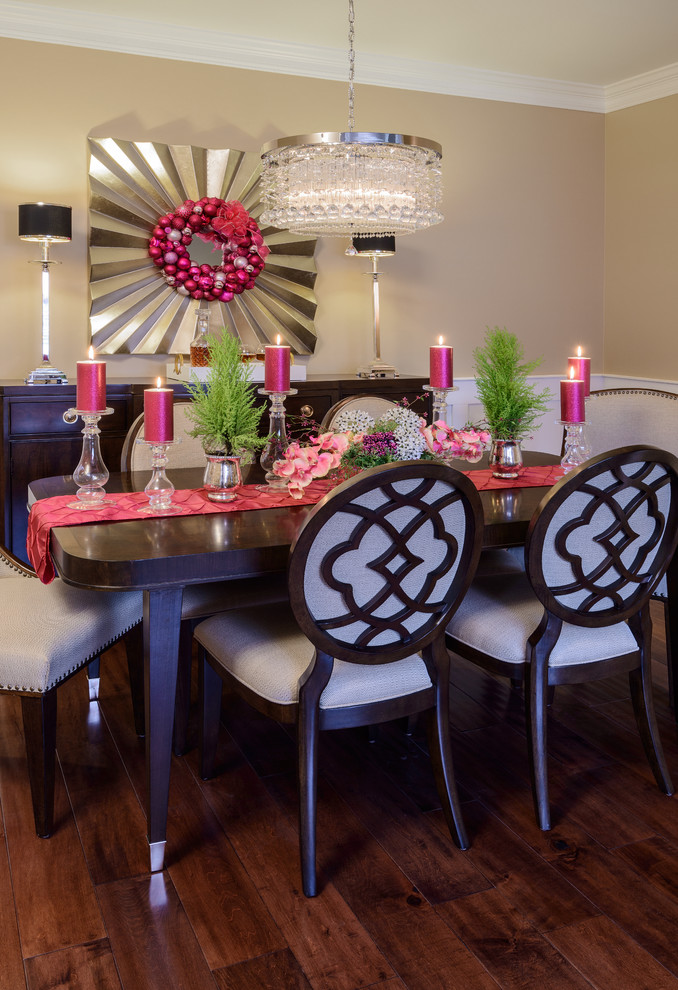 Inspiration for a small transitional medium tone wood floor dining room remodel with brown walls