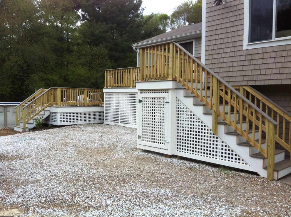 Deck - mid-sized backyard deck idea in Boston with no cover
