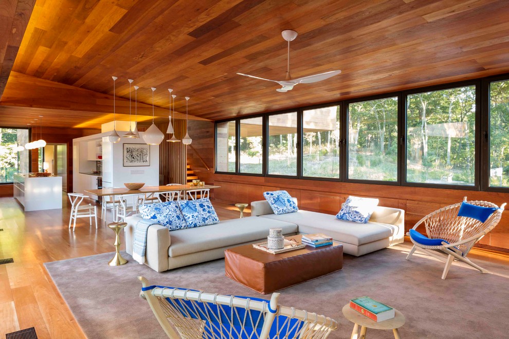 Photo of a beach style open concept living room in New York.