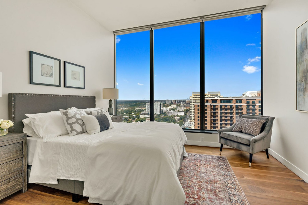 Transitional bedroom photo in Austin