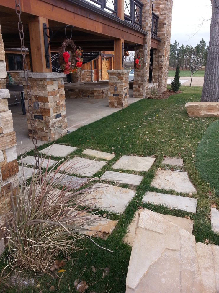 Mountain style home design photo in Denver