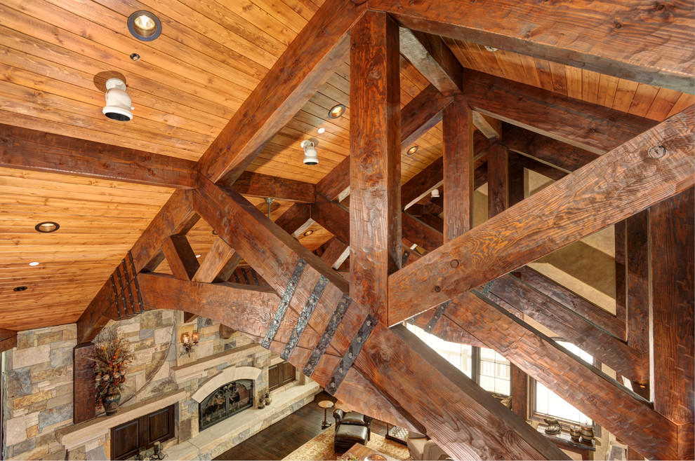 Example of a mountain style home design design in Denver