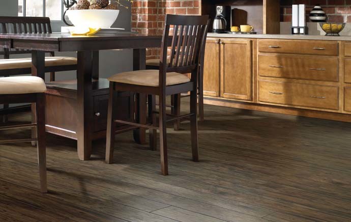 Home design - large transitional laminate floor home design idea with gray walls and no fireplace