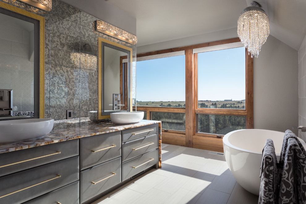 Freestanding bathtub - rustic master gray tile gray floor freestanding bathtub idea with flat-panel cabinets, gray cabinets, gray walls and a vessel sink