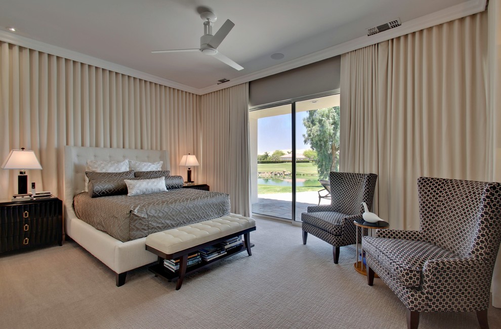 Inspiration for a mid-sized transitional master bedroom in Other with beige walls and carpet.
