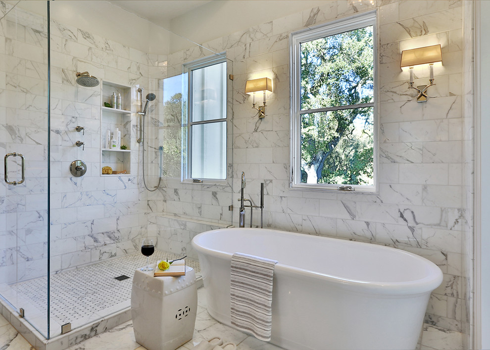 Example of a transitional white tile freestanding bathtub design in San Francisco with a niche