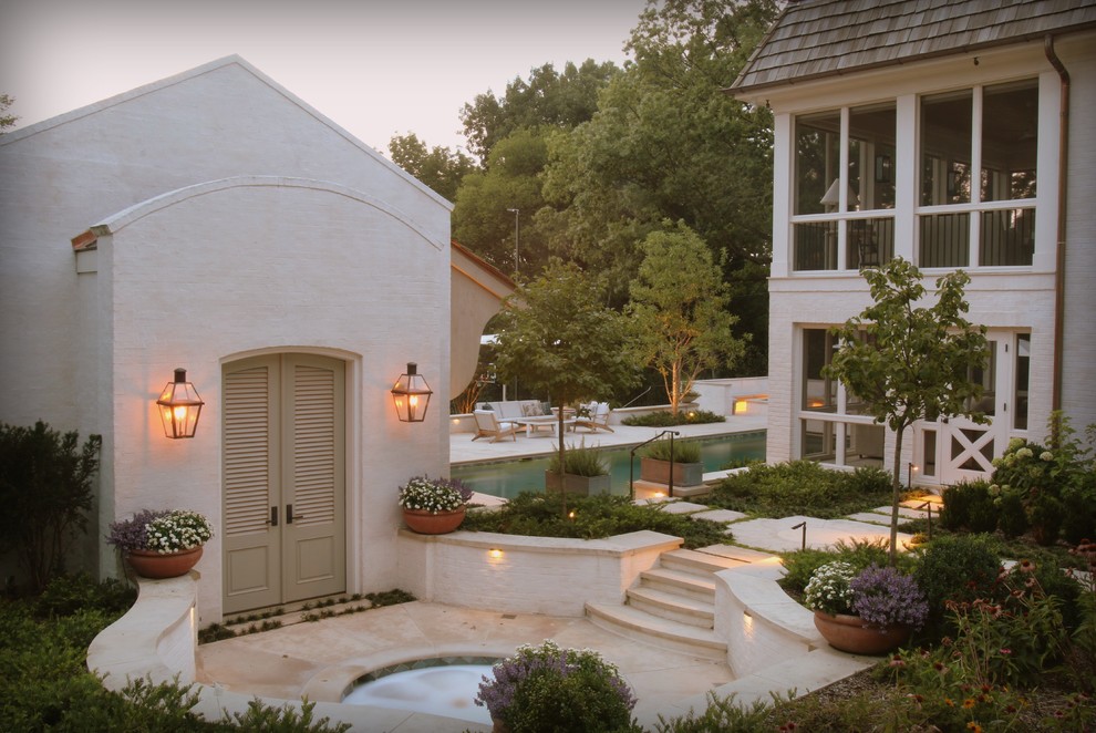 Hot tub - mid-sized transitional backyard stone and rectangular hot tub idea in Nashville