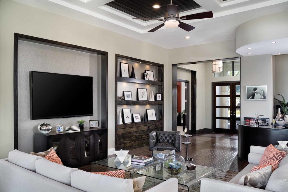 Inspiration for a mid-sized contemporary formal open concept living room in Orlando with grey walls, dark hardwood floors, no fireplace and a wall-mounted tv.