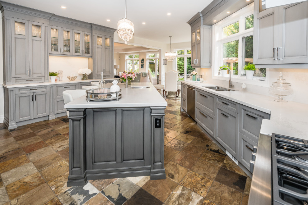 Example of a transitional kitchen design in Toronto