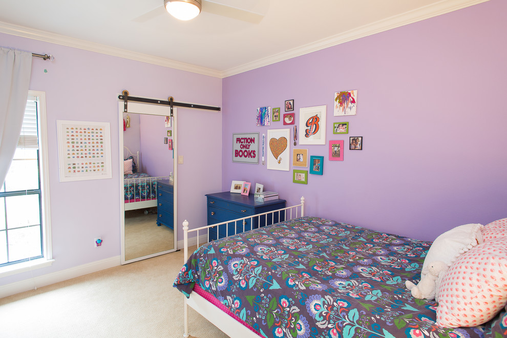 This is an example of a mid-sized transitional bedroom in Austin with purple walls, carpet, beige floor and no fireplace.