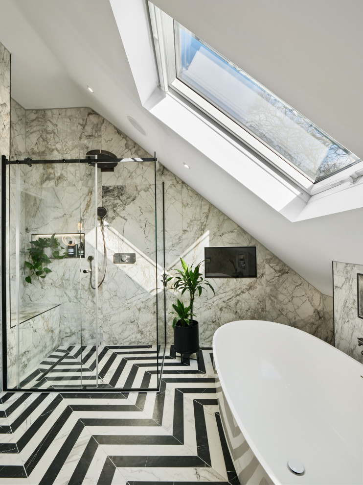 Design ideas for a large eclectic kids bathroom in Essex with a freestanding tub, a corner shower, beige tile, marble, beige walls, ceramic floors, marble benchtops, multi-coloured floor, a sliding shower screen and a single vanity.