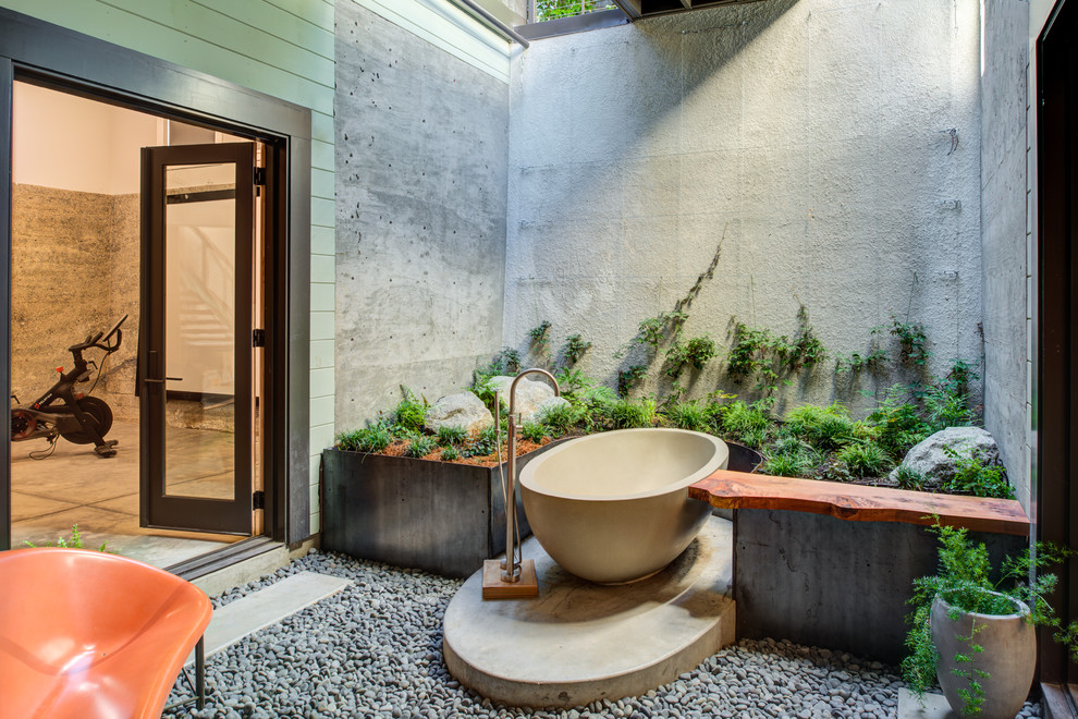 Inspiration for a midcentury bathroom in San Francisco with a freestanding tub.