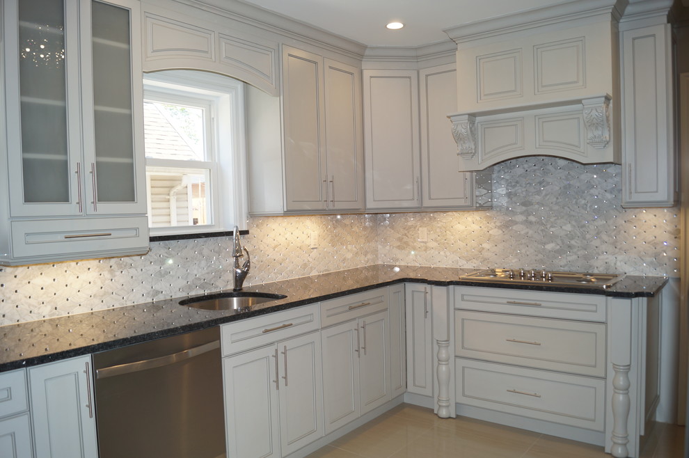 Example of a transitional kitchen design in New York