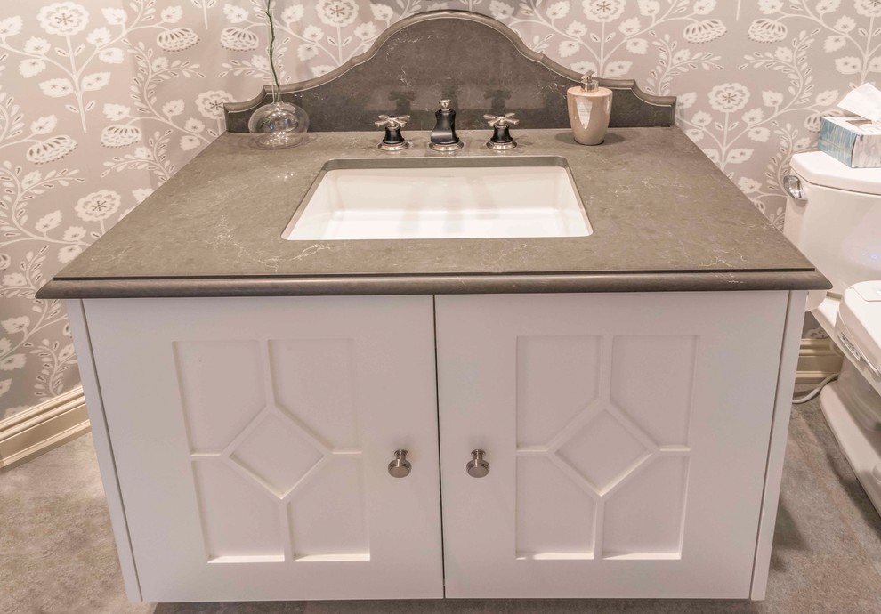 Inspiration for a mid-sized transitional 3/4 medium tone wood floor and brown floor home design remodel in Calgary with furniture-like cabinets, white cabinets and an undermount sink