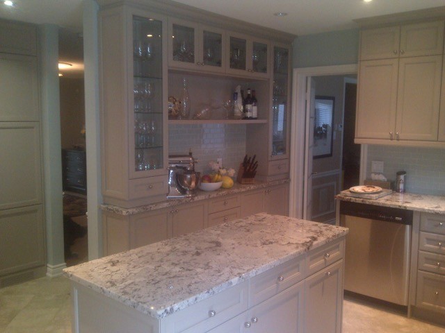 Example of a transitional kitchen design in Toronto