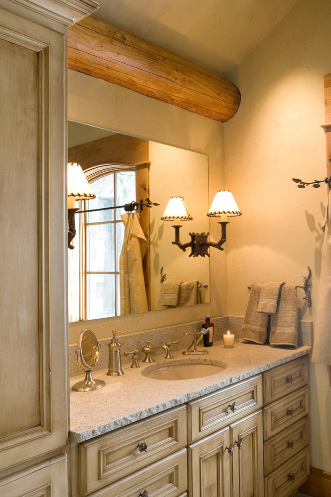 Example of a large mountain style master bathroom design in Denver with recessed-panel cabinets, light wood cabinets and granite countertops