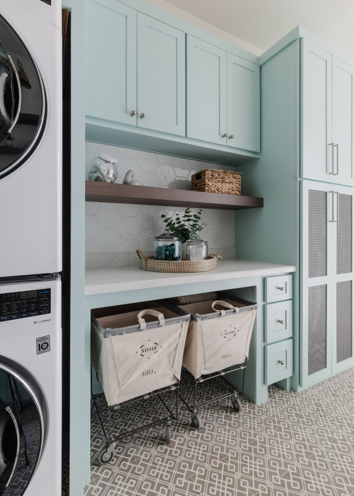 Design ideas for a transitional laundry room in Houston.