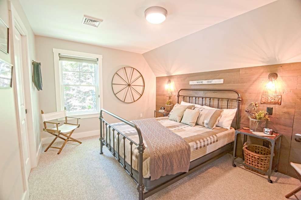 Mid-sized country guest bedroom in Portland Maine with grey walls, carpet and grey floor.