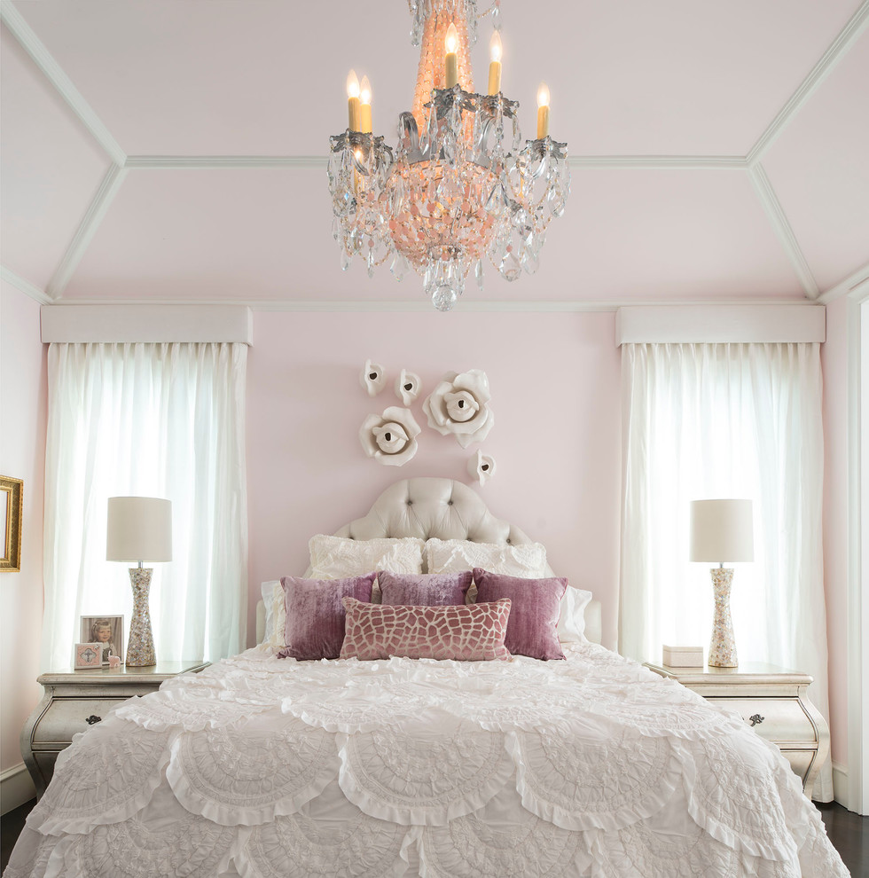 Design ideas for a traditional bedroom in Dallas with pink walls and dark hardwood floors.