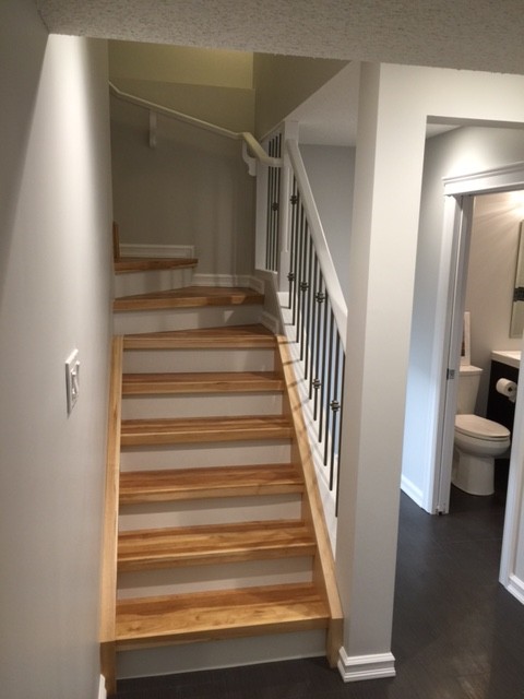 Inspiration for a contemporary staircase remodel in Edmonton