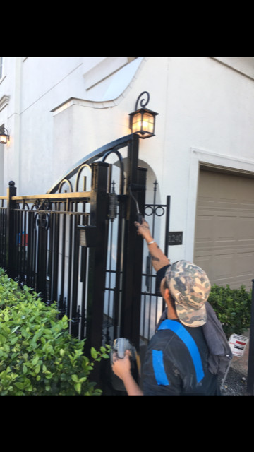 Wrought Iron Fence Renewed & Repainted.