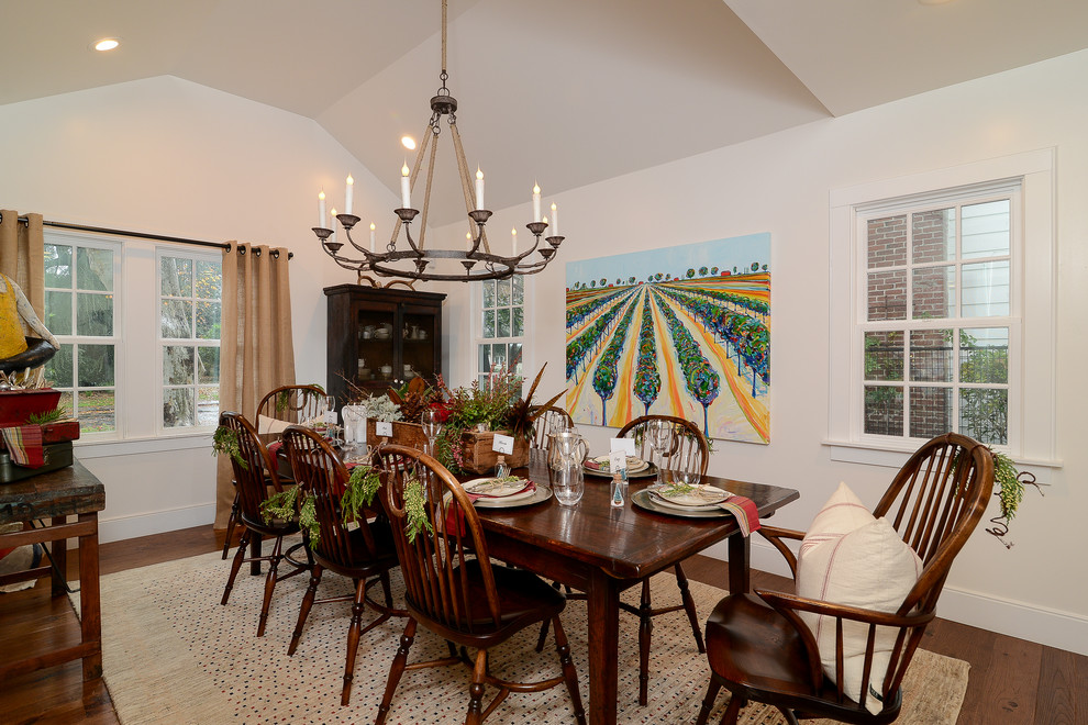 Mid-sized country separate dining room in Sacramento with white walls and medium hardwood floors.