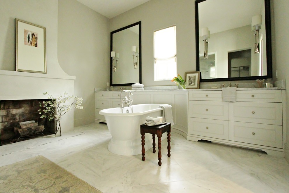 This is an example of a traditional bathroom in Atlanta with a freestanding tub.