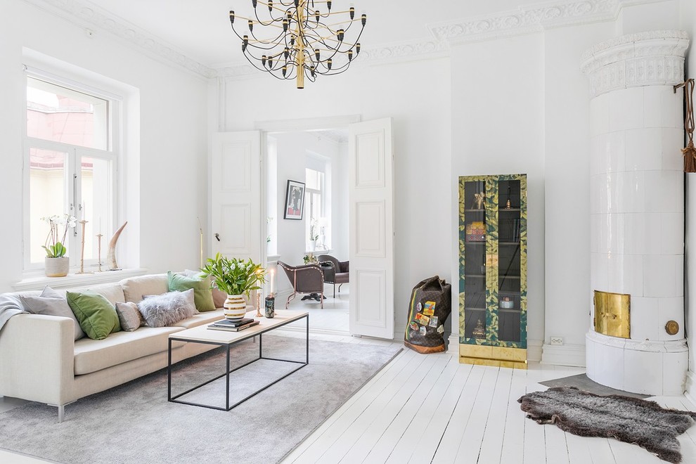 Inspiration for a mid-sized scandinavian formal open concept living room in Gothenburg with white walls, painted wood floors and no tv.