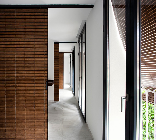 Moncada House contemporary-hallway-and-landing