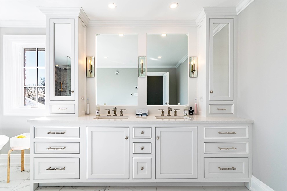 Large transitional master bathroom in Toronto with beaded inset cabinets, white cabinets, a freestanding tub, a curbless shower, a one-piece toilet, gray tile, porcelain floors, an undermount sink, engineered quartz benchtops, white floor, an open shower, white benchtops and white walls.