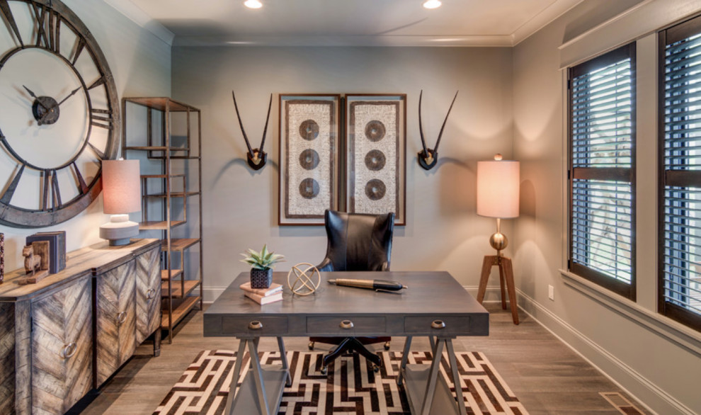 Inspiration for a mid-sized transitional home studio in Indianapolis with dark hardwood floors, no fireplace and a freestanding desk.