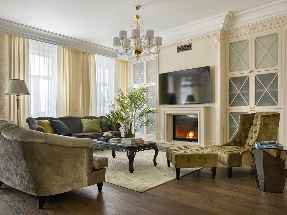 Inspiration for a large traditional formal open concept living room in Moscow with beige walls, dark hardwood floors, a standard fireplace, a stone fireplace surround and a wall-mounted tv.