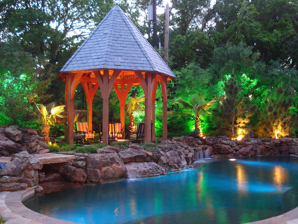 Photo of an eclectic pool in Dallas.