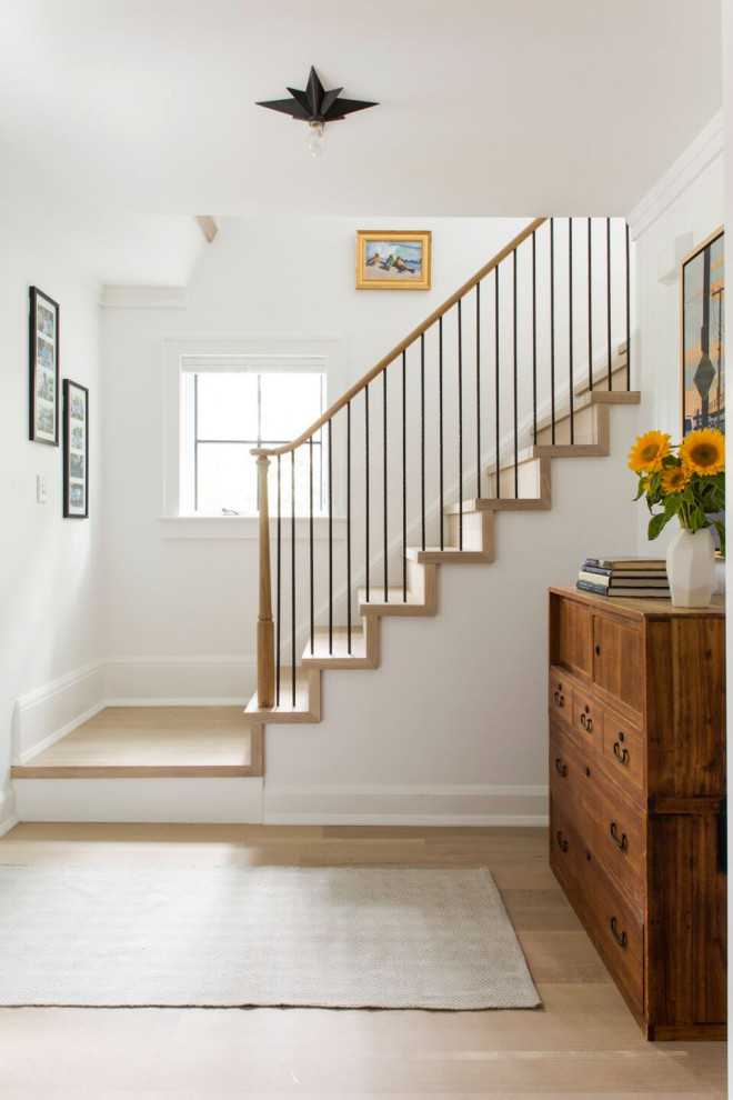 Inspiration for a mid-sized transitional wood straight staircase in Other with mixed railing.