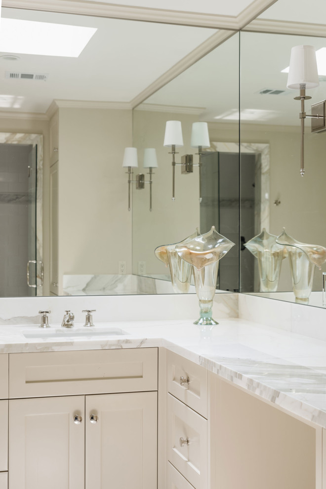 Mid-sized transitional bathroom in Houston with an undermount sink, shaker cabinets, beige cabinets, marble benchtops, a two-piece toilet, white tile, stone tile, beige walls, marble floors and with a sauna.