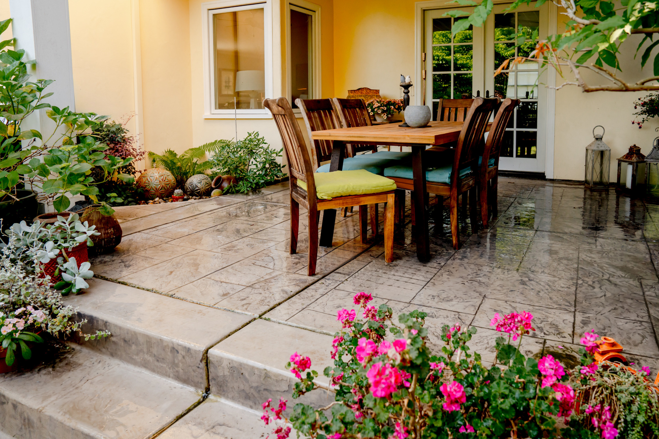 Layered Living: Patio Dining and Garden Views